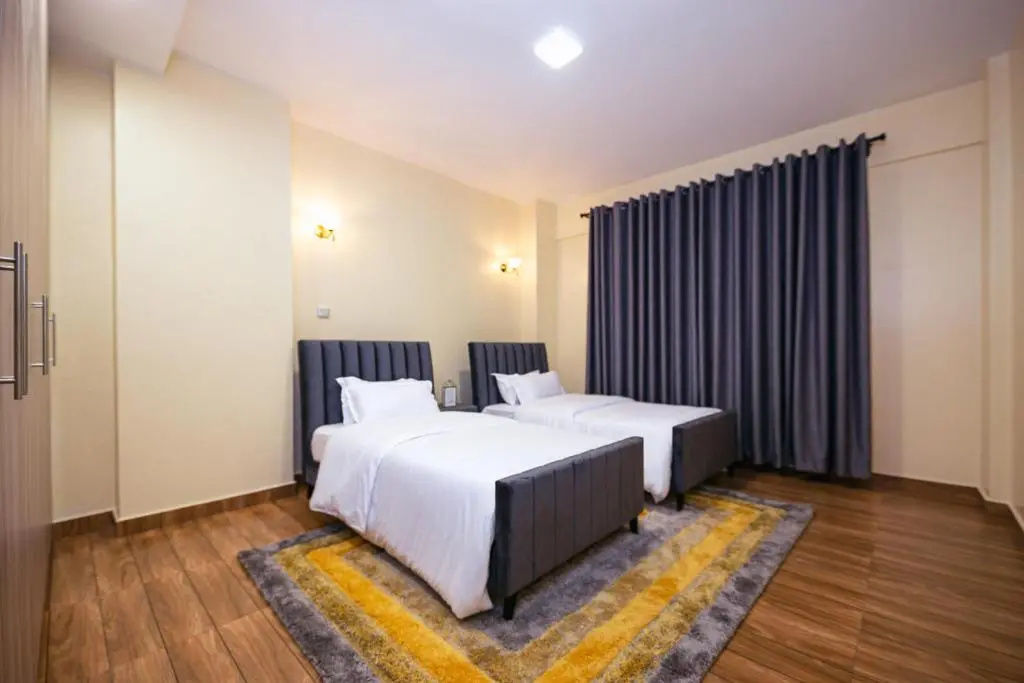 K's Place - Elegant 2 Bedroom Apartment with a Pool & Gym