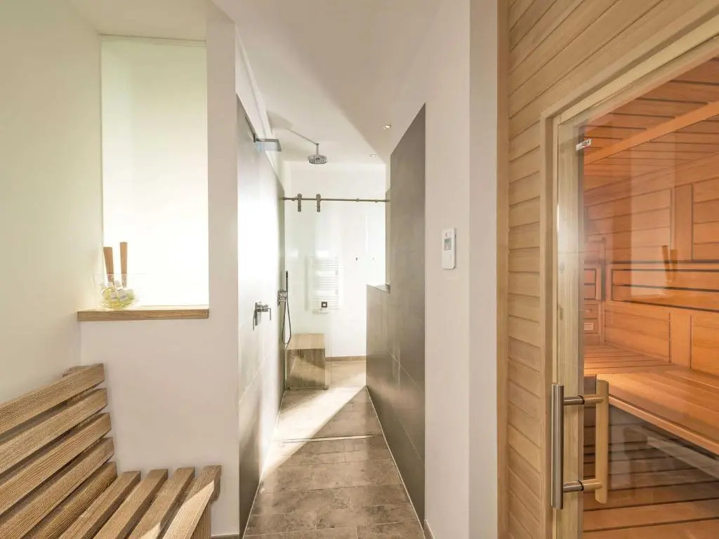 Villa Philine - Penthouse 28 mit Panoramablick, Pool, SPA & Kamin