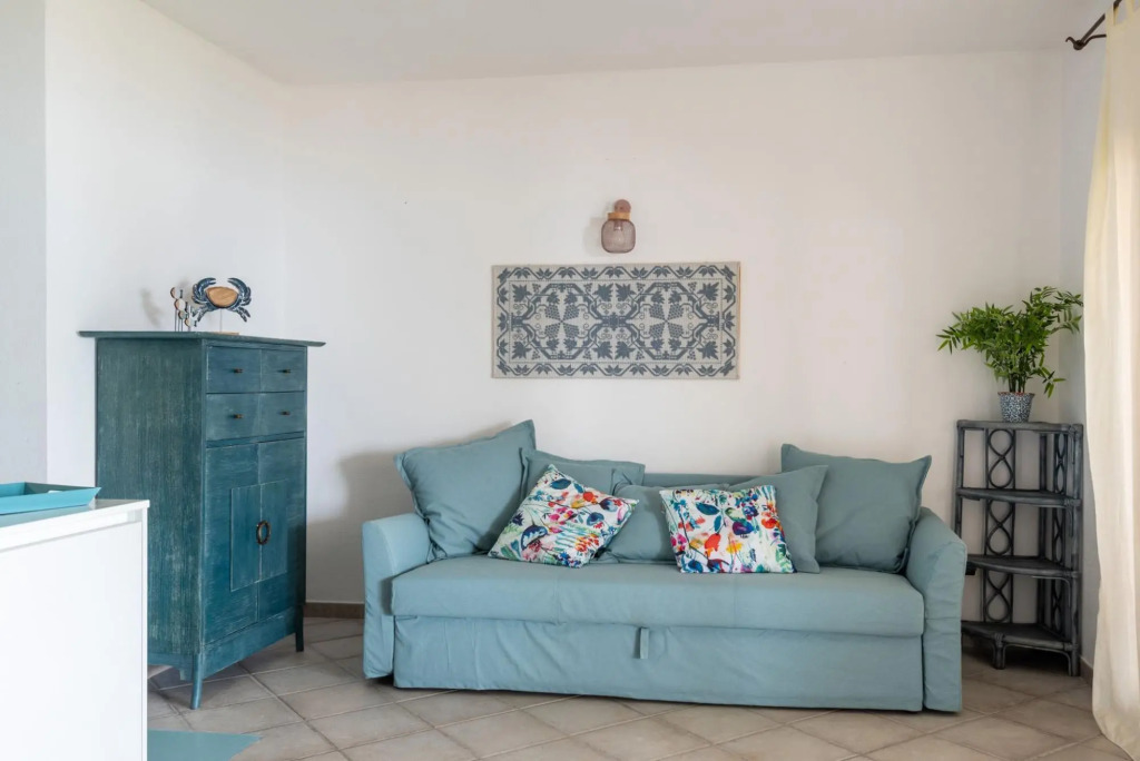 It consists of a large living room with comfortable sofa bed for 2 persons, two double bedrooms with-S'ABBA DI SU