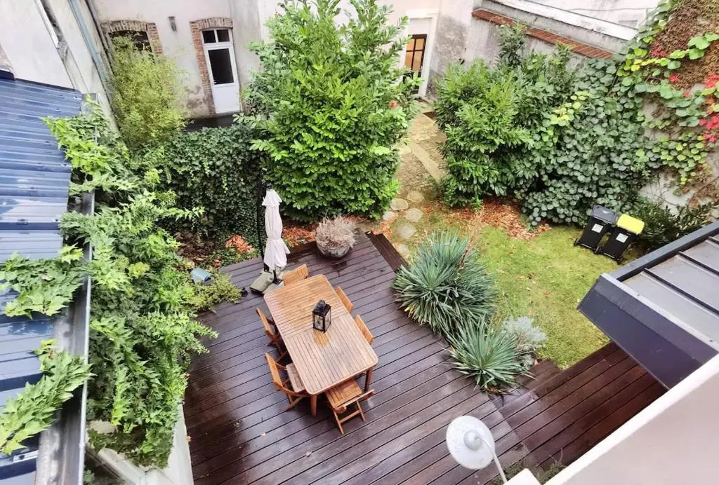 Maison de ville avec terrasse et jardin