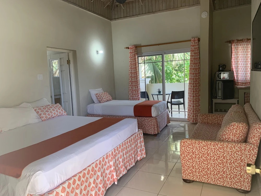 King Suite at Oceanview Resort in Jamaica - Enjoy 7 Miles Of White Sand Beach! 1 Bedroom Villa by RedAwning