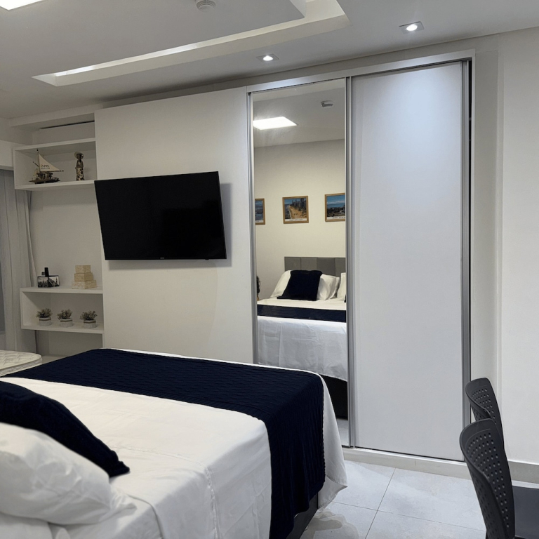 Flat com piscina a 50m da praia