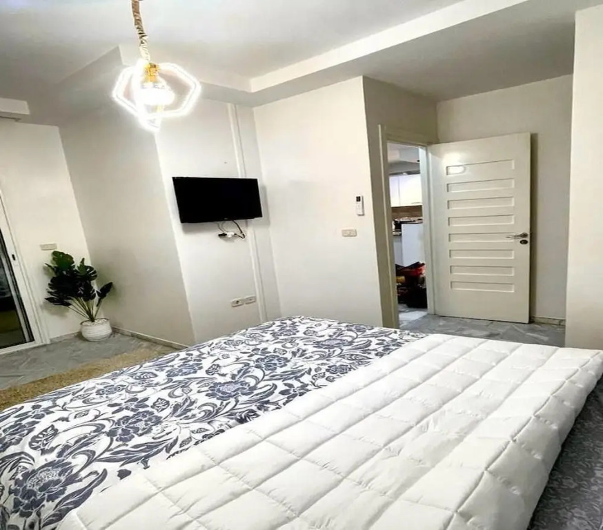 Cozy 1BR Retreat, Steps to Sand