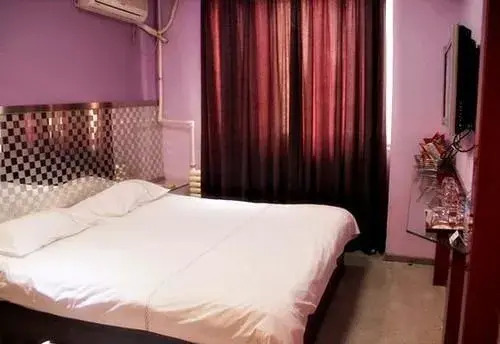 Harbin Xilong Hotel Ren He Branch