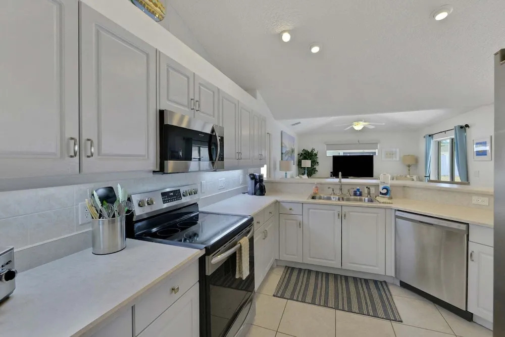Contemporary Coastal Escape With Heated Pool, Fenced Yard, & Outdoor Dining