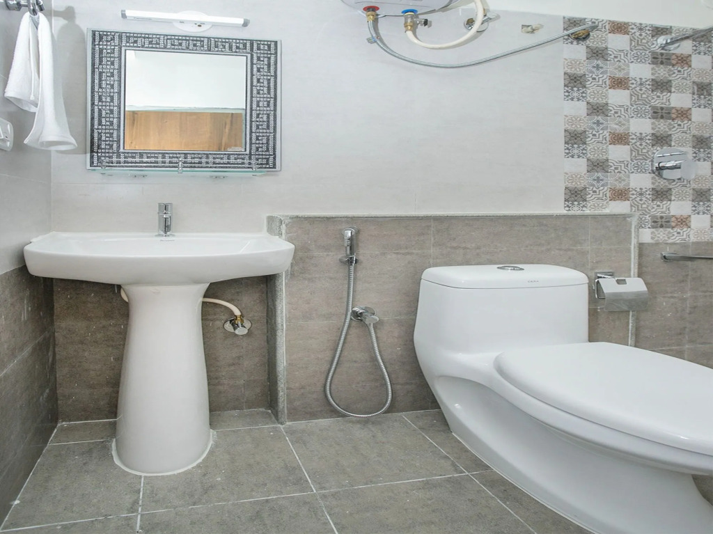 OYO 11387 Hotel Kozy Rooms