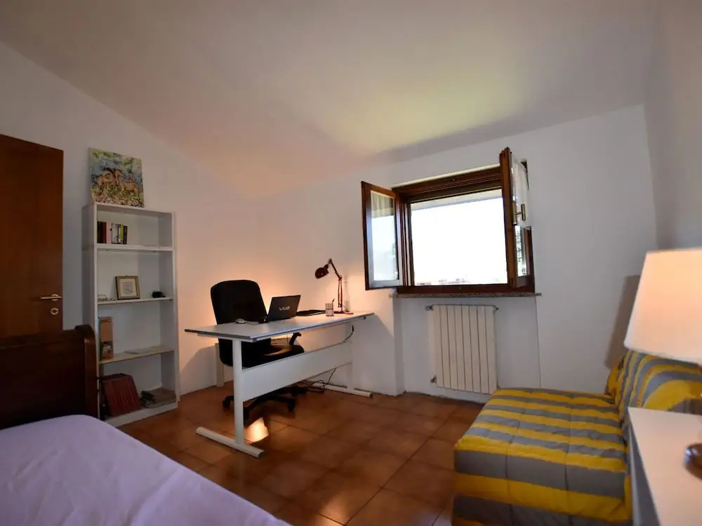 Two-family home with private garden 100 metres from the lake and beach