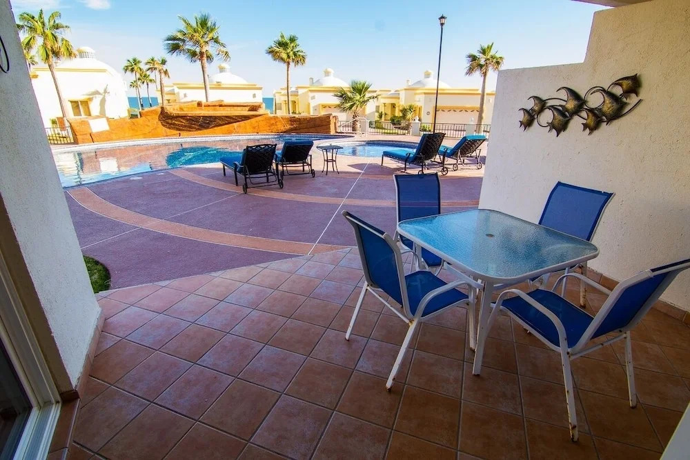 Spectacular 1 1/2 Bedroom Condo on Sandy Beach at Las Palmas Beachfront Resort 1 Condo by RedAwning