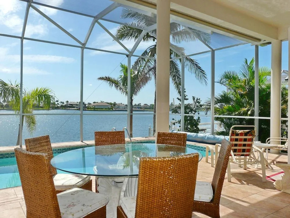 Waterfront home with views, pool and walk to beach