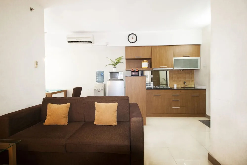 2BR Cozy at Empyreal Epicentrum Apartment By Travelio