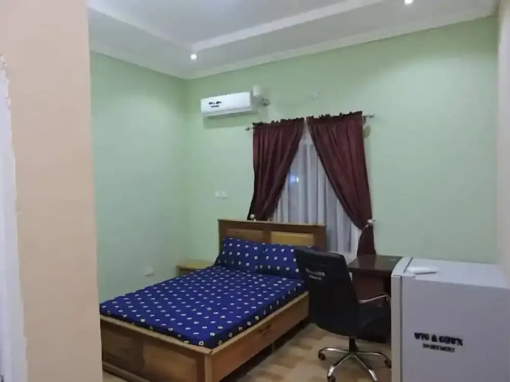 Wig and Gown Apartment