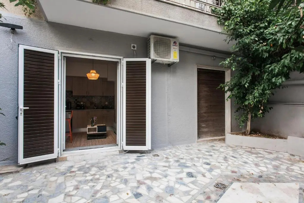 Walk through Athens, based in a local’s hip house!
