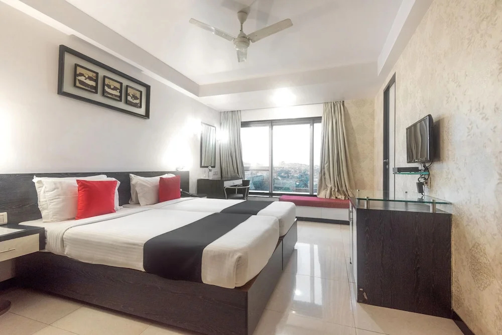 Capital O 45497 Savoy Suites