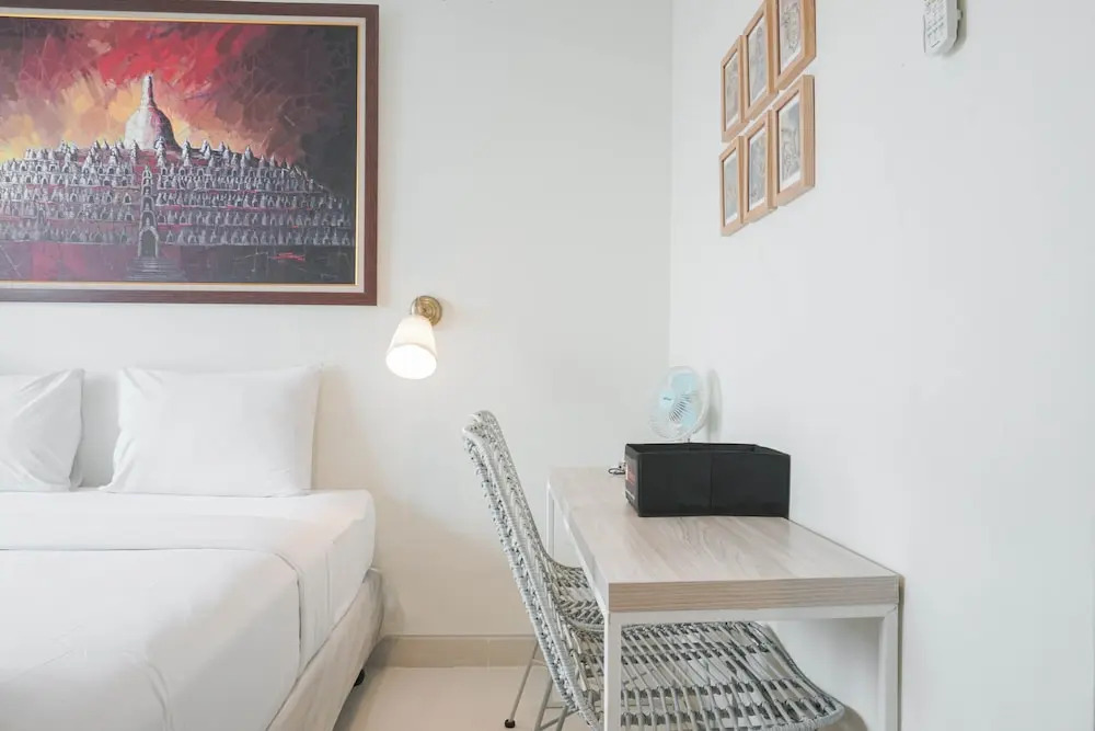 Minimalist Studio Room With City View At West Vista Apartment