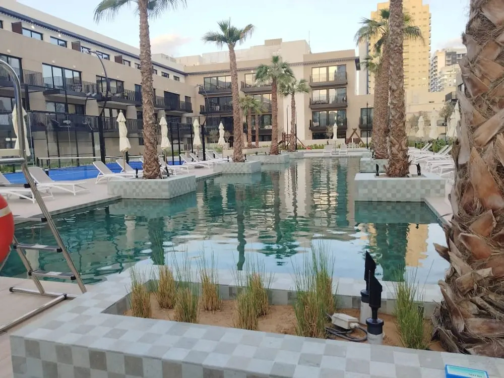 Free housekeeping visits during your stay - StayShort - Stylish, Minimalist 2-Bedroom in Jumeirah Village Circle