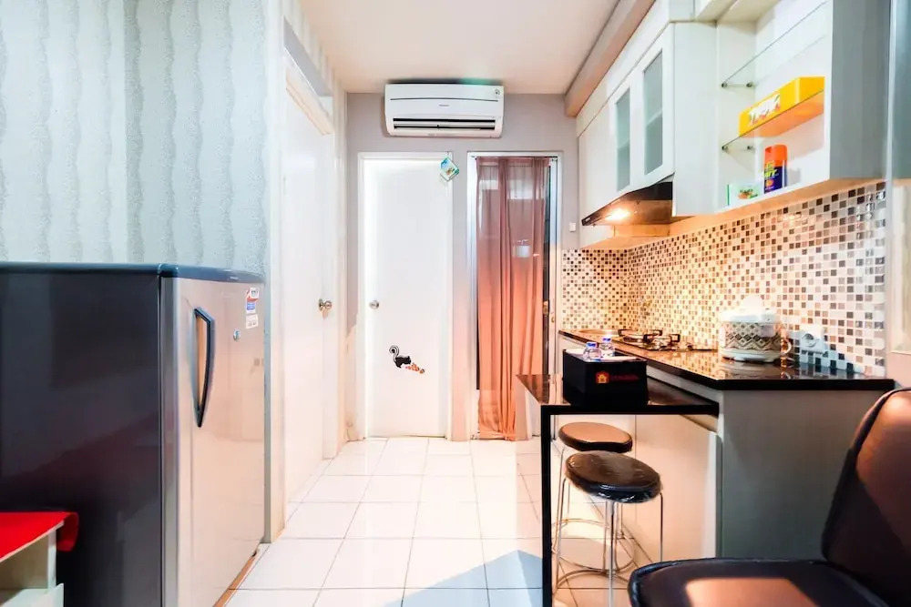 Homey 2BR Kalibata City Apartment