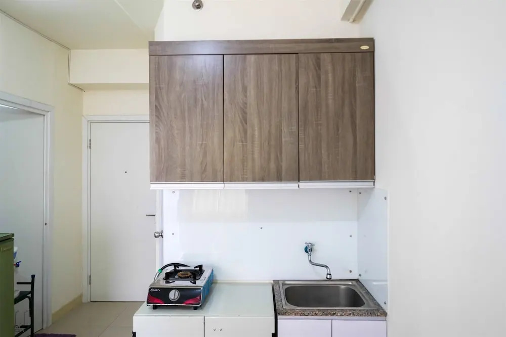2BR Artistic Room Green Pramuka Apartment closed to Mall By Travelio
