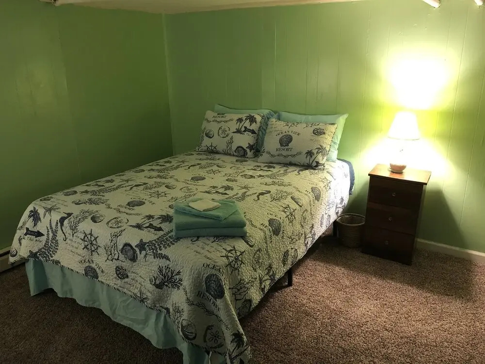 Rustic Beach Front Basement Apt, Pet Friendly Wi-fi 2 Bedroom Apts by RedAwning