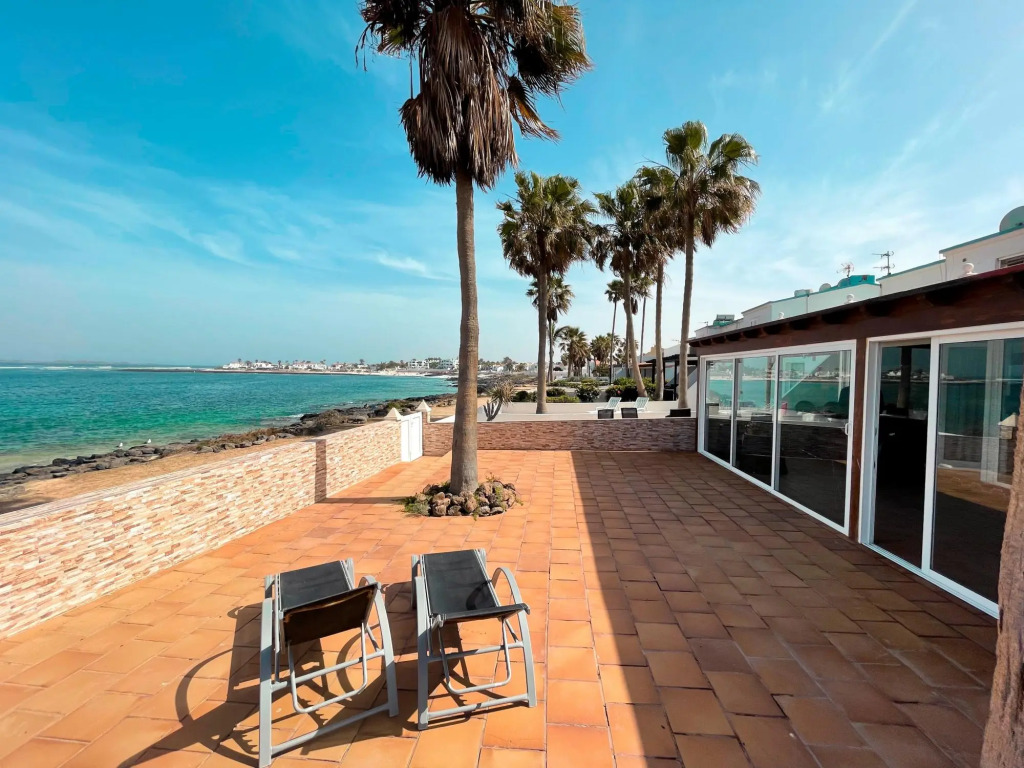 Beachfront Villa San Antonio with Private Heated Pool BBQ in the Heart of Corralejo by Amazzzing Travel