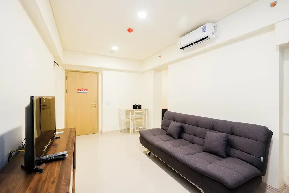 Homey and Cozy Living 1Br + Working Room at Meikarta Apartment