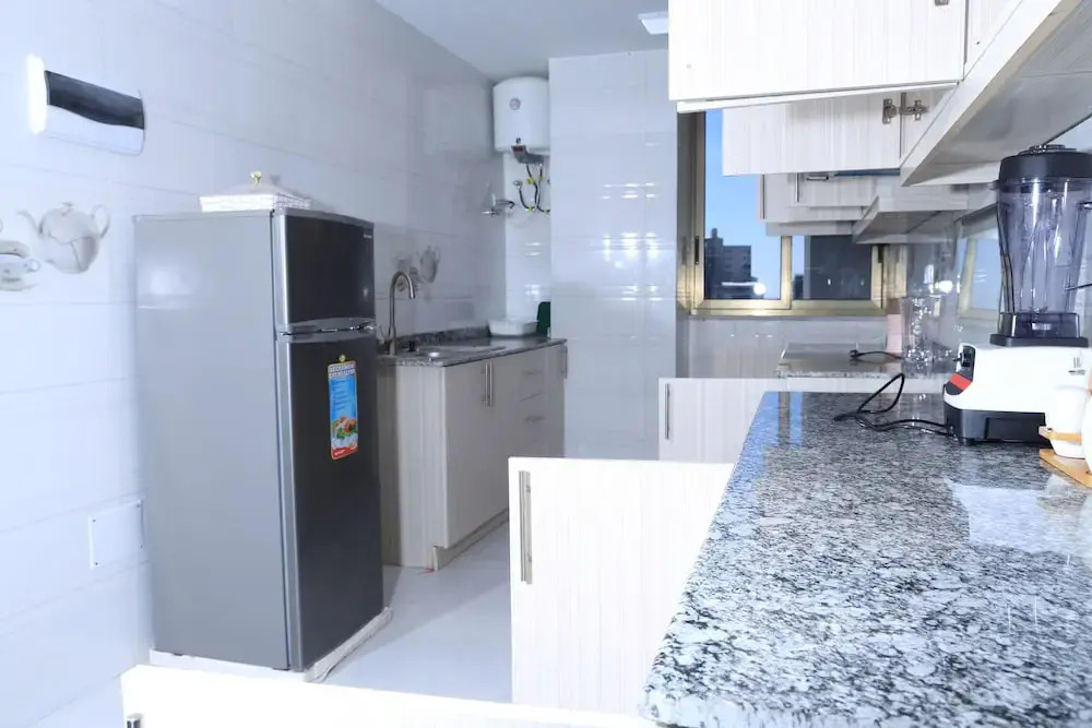 PrimeNest - 3 bedroom Apartment