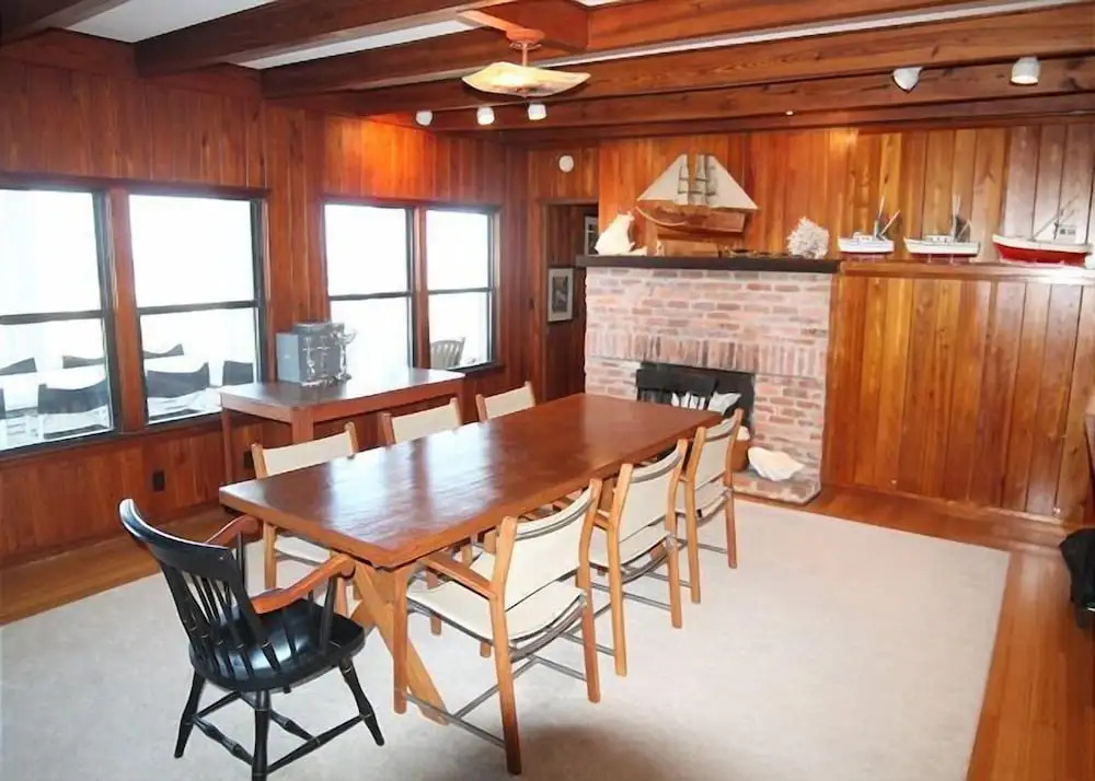 Ocean front Vacation Home with a large screened-in Patio by RedAwning
