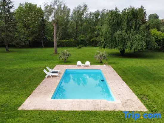 Family apartment by the Marne River   Pool, garden & free parking near Disneyland