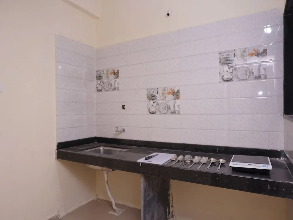 OYO Living Sriram heights Bhekrai Nagar Near Kumar Park Infinia