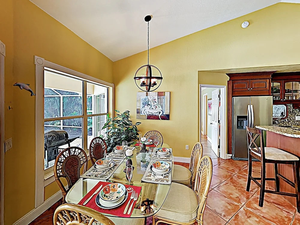 Riverfront Paradise W/ Caged Pool, Hot Tub & Dock 3 Bedroom Home