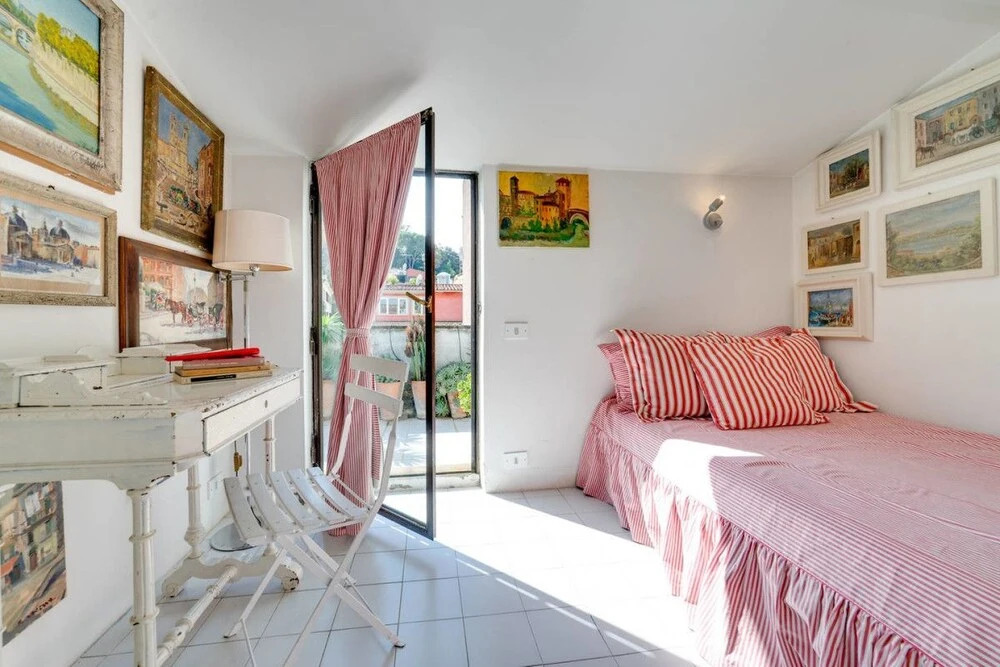 Luxury Art Apt With Terrace in Trastevere, Serviced by Hostmaker