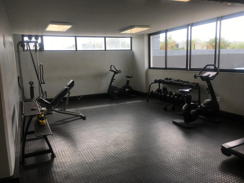 Highrise Windhoek apartment with skyline view, pool and gym