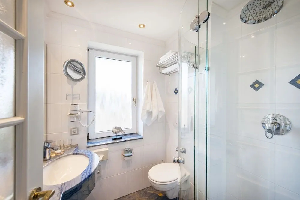 Büngers Apartment-Hotel mit Gartensauna - modern, gemütlich und strandnah