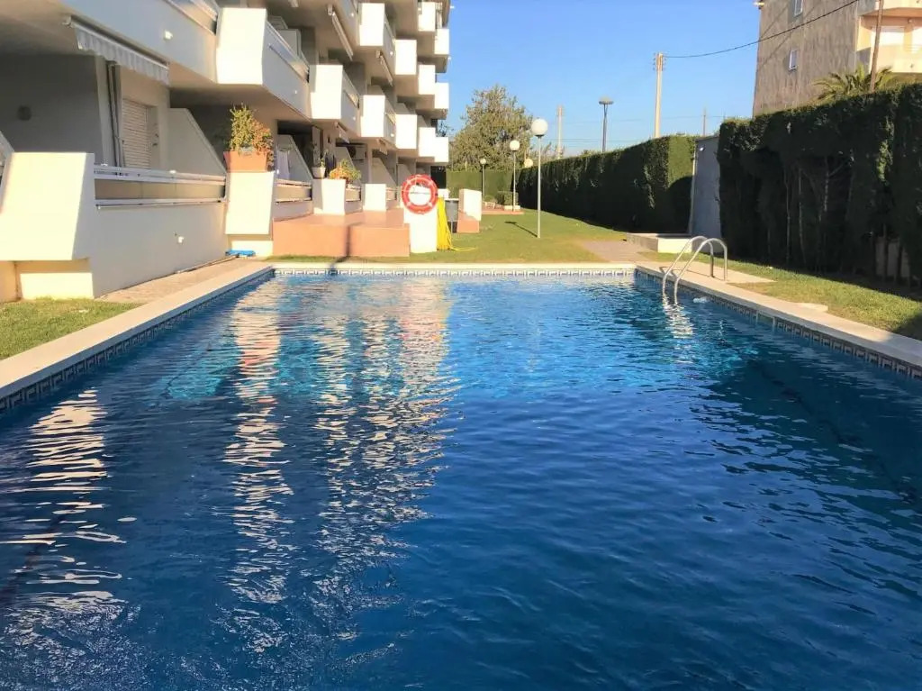 ático con barbacoa, piscina y parking 133B - INMO22
