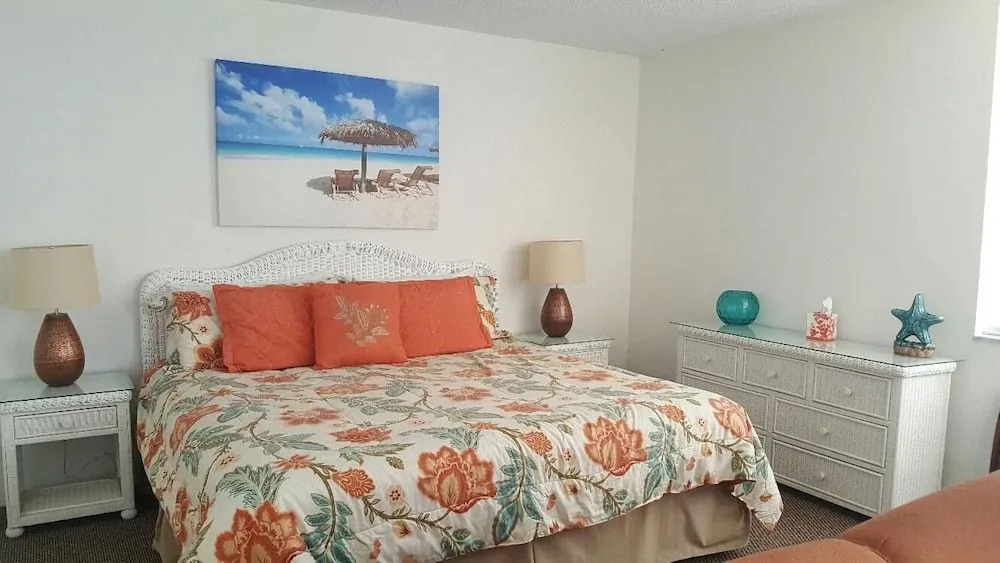 Estero Beach & Tennis #105B by RedAwning