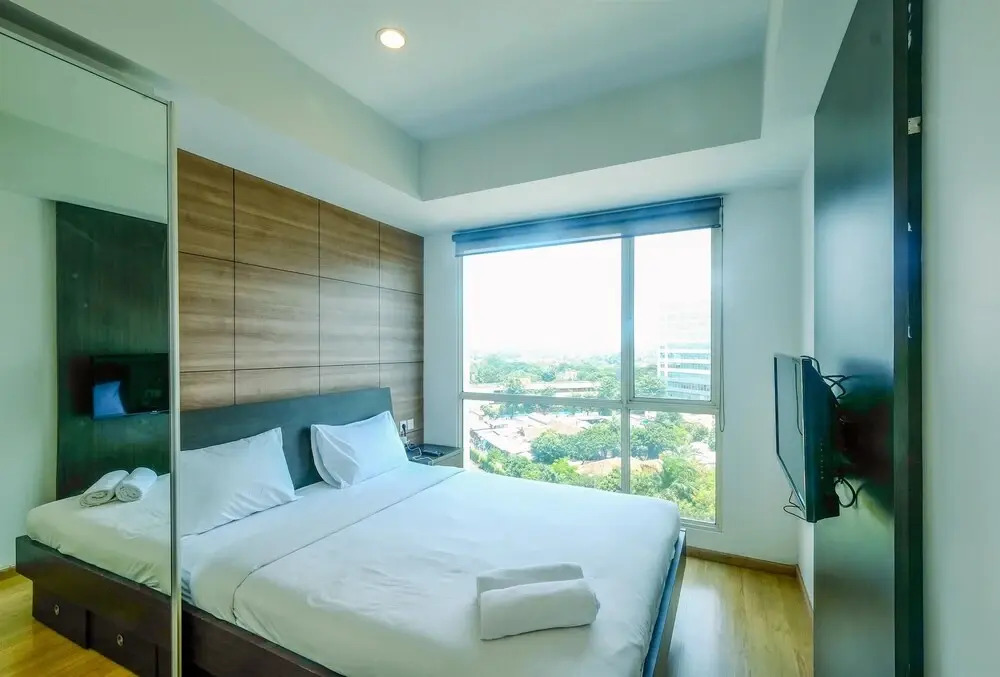 Best Location and Modern 2BR at Casa Grande Apartment