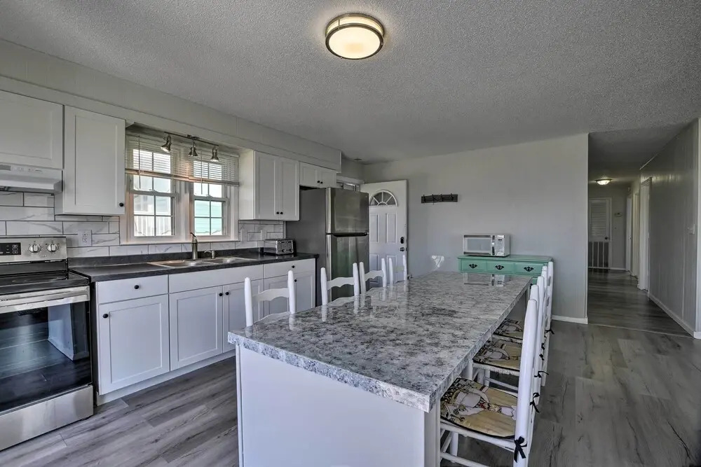 Oak Island Beach Abode w/ Deck: Walk to Shore!