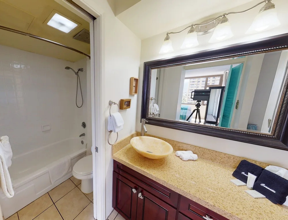 Waikiki Banyan High Level Condo with Ocean Views from the Private Lanai