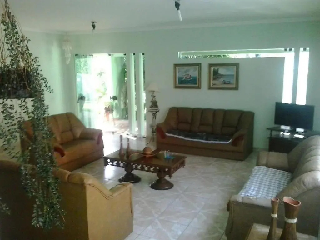 Casa com ar condicionado a 50 metros da Praia da Riviera no Jardim São Lourenço - Casa com Wi-Fi