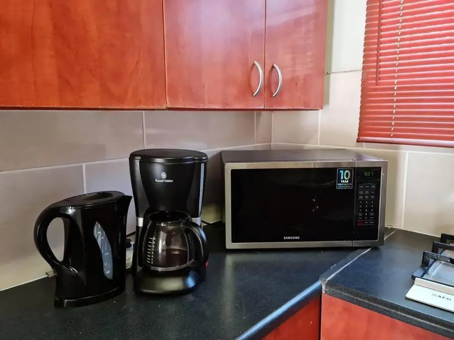Justin's Place Lounge. An Exceptional Home with no Load Shedding, by The Grove Mall and Wilgers Hospital.