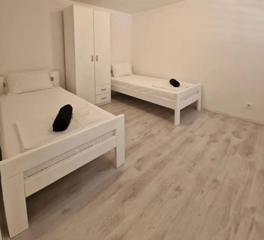 Four Bedroom apt w Patio Close to Beach and Center