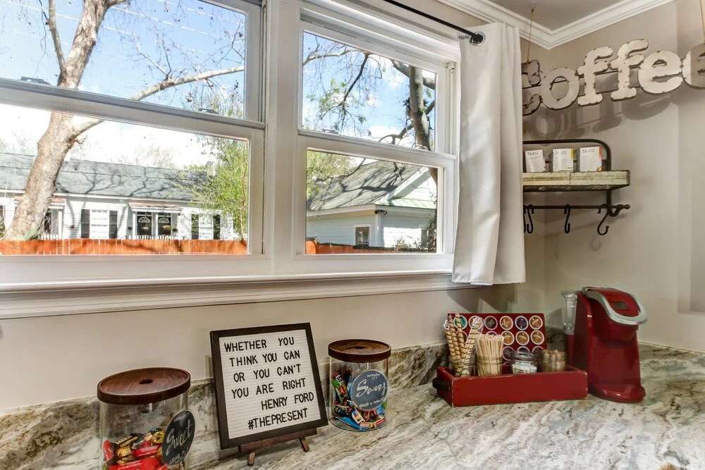Vibrant, Colorful Condo Building With Backyard Firepit and Games