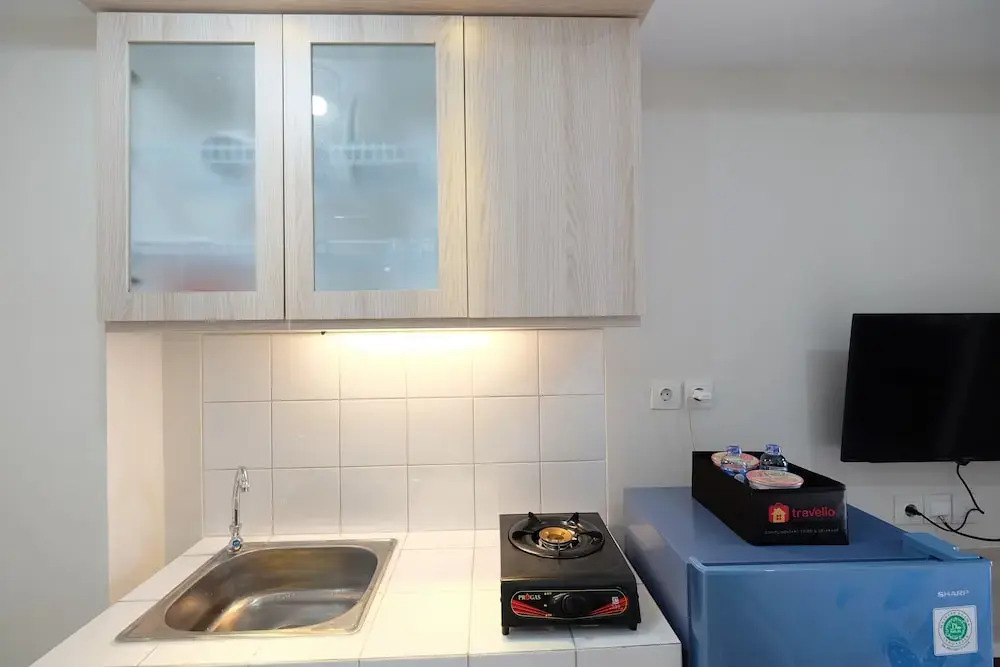 Comfortable Studio at Springlake Summarecon Apartment near Mall By Travelio