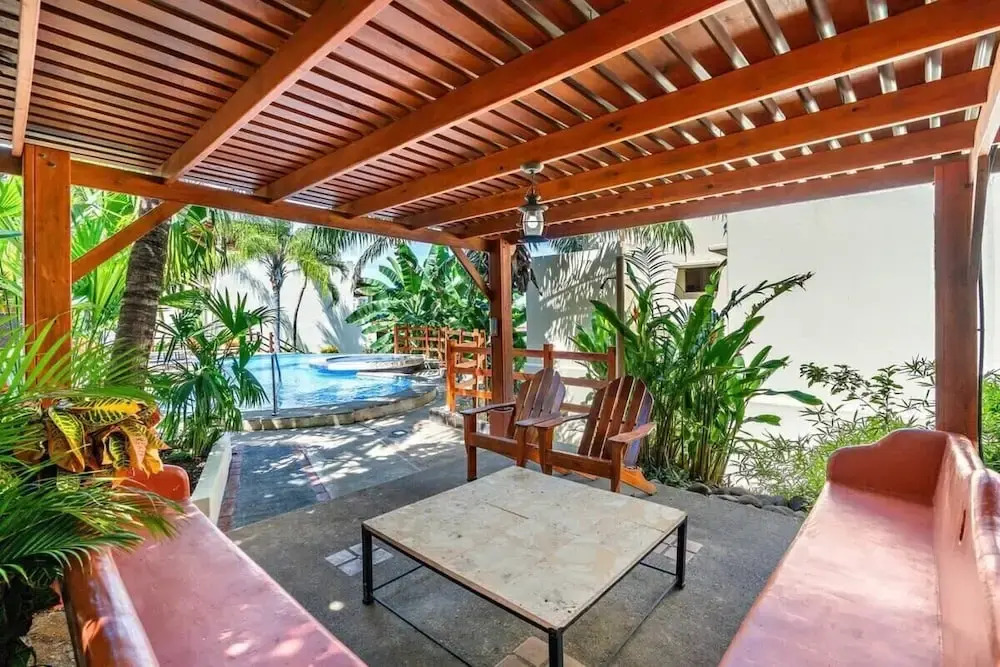 Modern Split-Level 2-Bedroom Condo with Pools, Terrace & Easy Beach Access