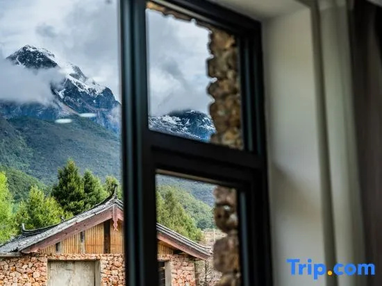 Listening to the wind · Courtyard Green Forest Rizhao Jinshan View Inn (Yulong Snow Mountain)