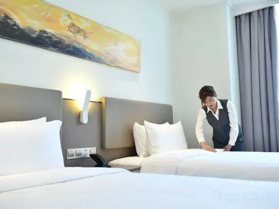 Elong Anyun Hotel (Shanghai Hongqiao Airport Xinzhuang, Qibao)