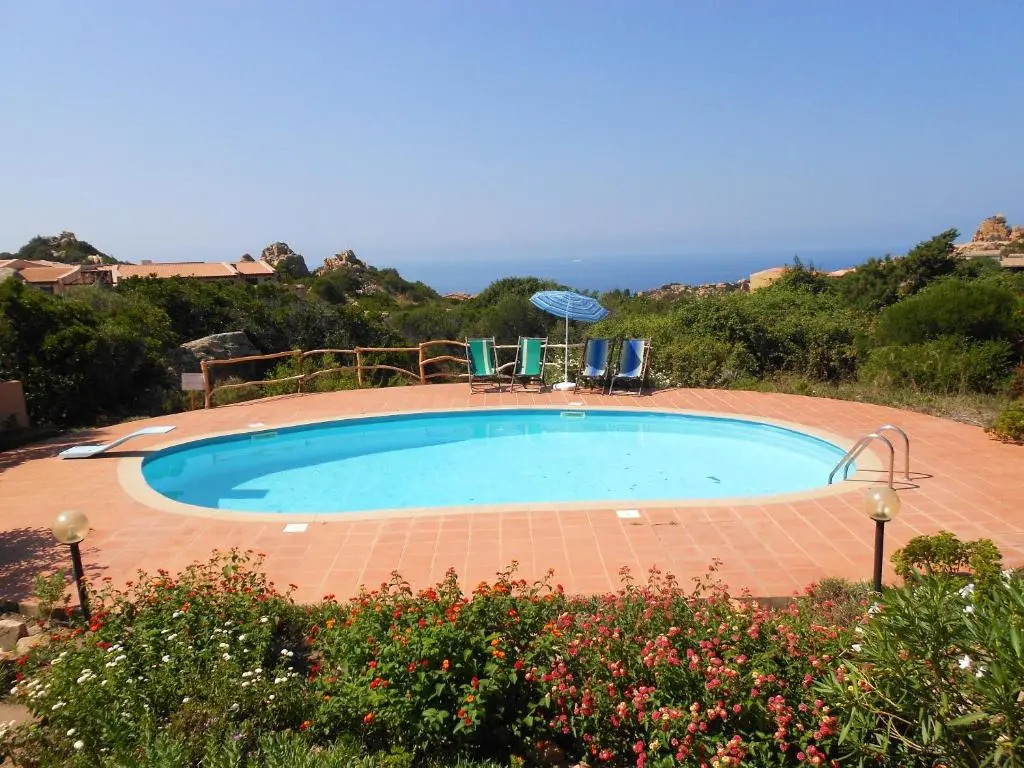 2 bedrooms house with sea view shared pool and furnished garden at Costa Paradiso 2 km away from the beach