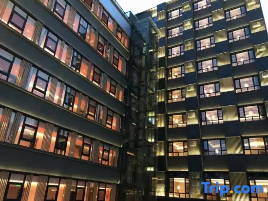 Jianguo HIDDEN Hotel (Pu'er Tea Source Plaza Daijia Alley)
