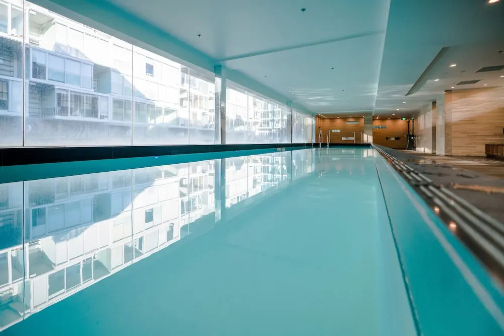 Waterfront Luxury with Pool & Gym