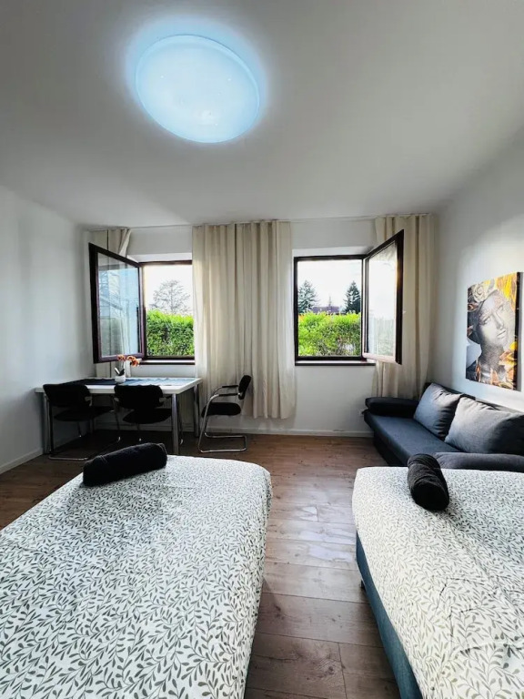 Stylish 3BR Apt Outdoor Space Sleeps 8