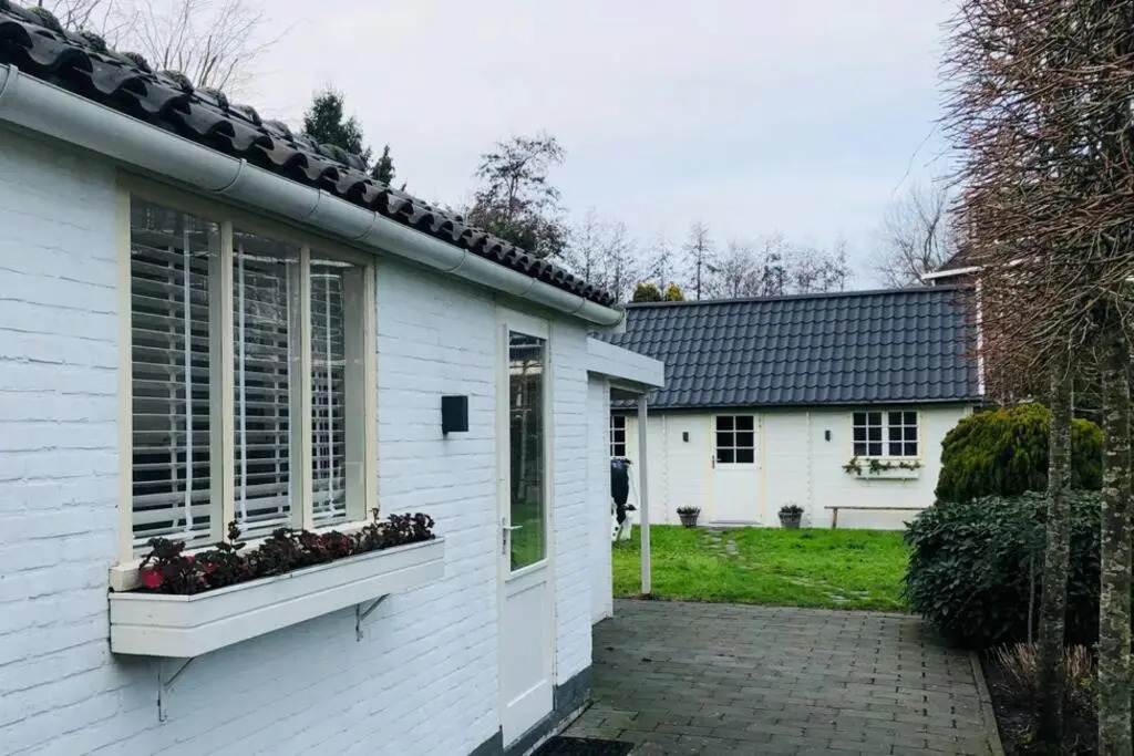 Tiny house in tuin van de statige villa Mariahof